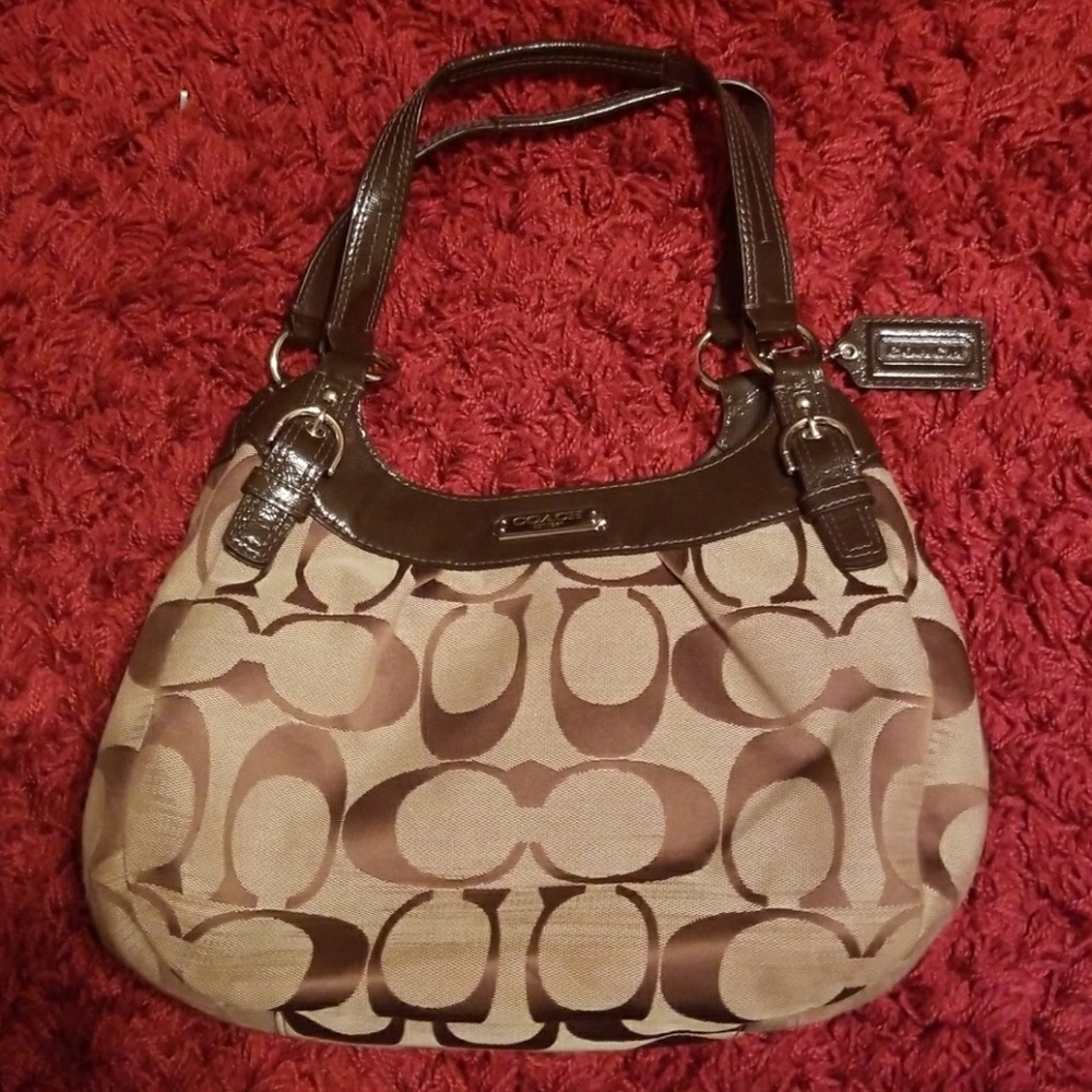 Tan Coach cloth and leather purse
